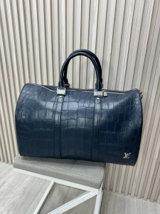 Дорожная сумка из кожи крокодила Louis Vuitton Дорожная сумка из кожи крокодила Louis Vuitton